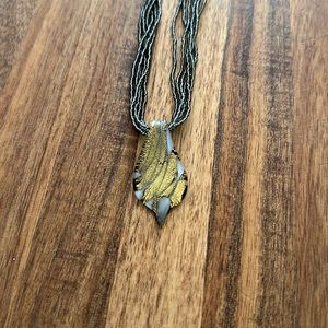 Glass necklace from Italy.